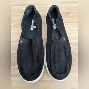 Sanuk women’s black slip on shoes